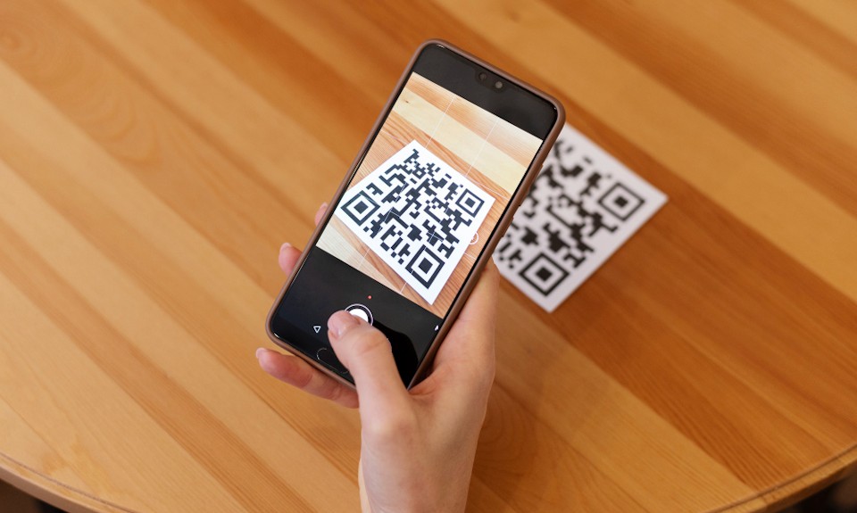 person scanning qr code